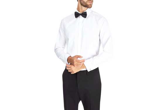 Here's an alt tag for the image: Man in white shirt and black bow tie.