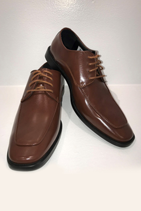 Pair of brown leather dress shoes.