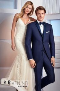 Elegant bride and groom in formal wear.