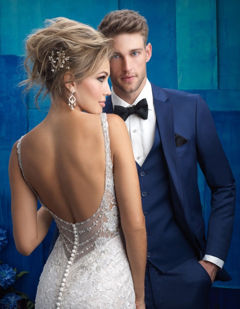 Bride and groom in wedding attire.