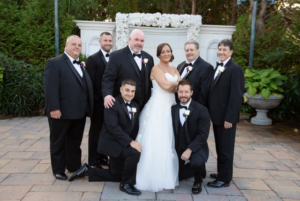 Wedding party posing for a photo.
