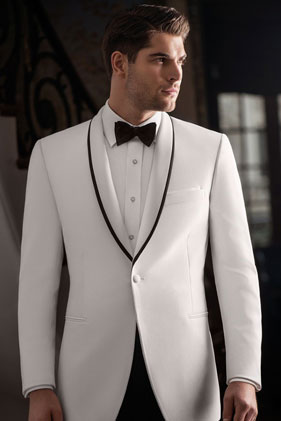 Man in white tuxedo with black lapel.