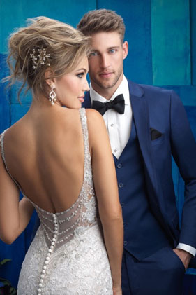 Bride and groom in wedding attire.