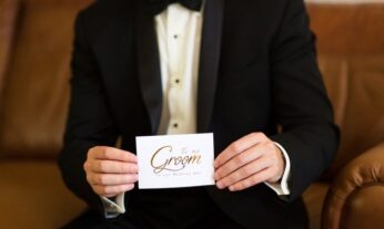 Groom holding "To my Groom" card.