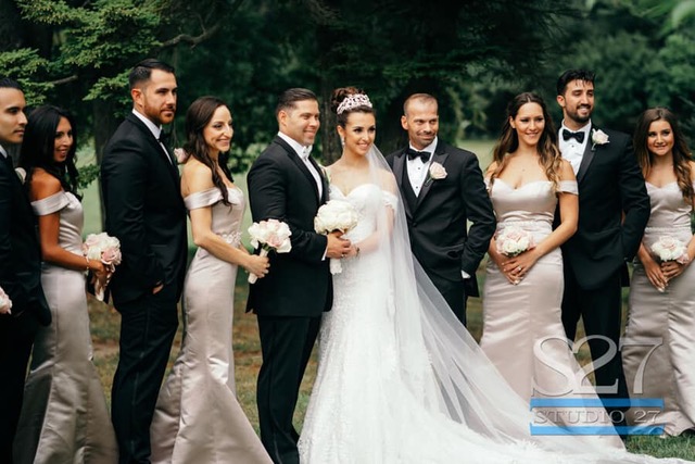 Bride and groom with wedding party.