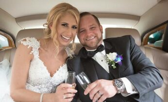 Happy bride and groom in a limo.